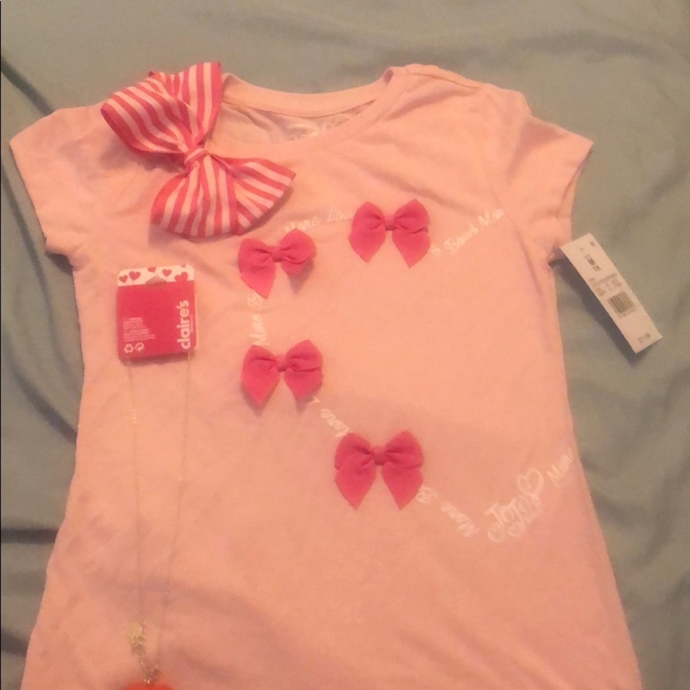 pink jojo siwa shirt with jeans